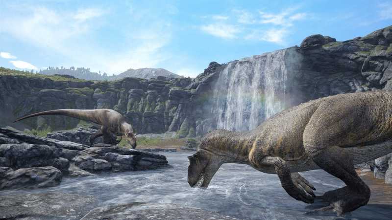Two carnivorous dinosaurs drinking from a shallow river below a waterfall and mossy cliffs on a sunny day